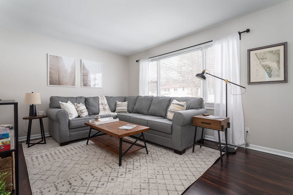 Gather in the light filled living room.