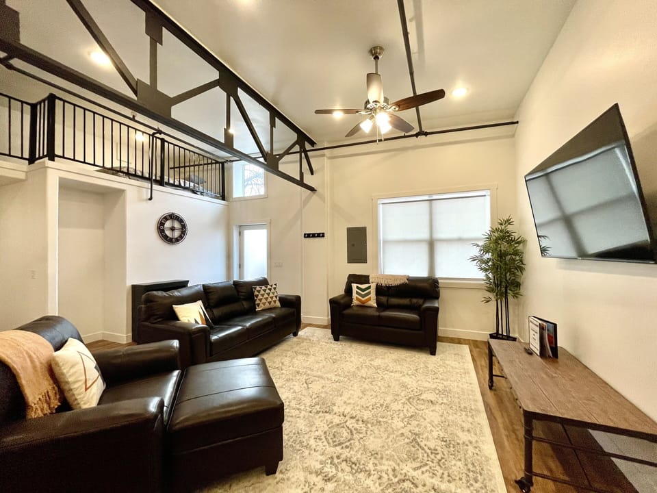 Living room / main entry / loft space. 60" TV and comfortable seating!
