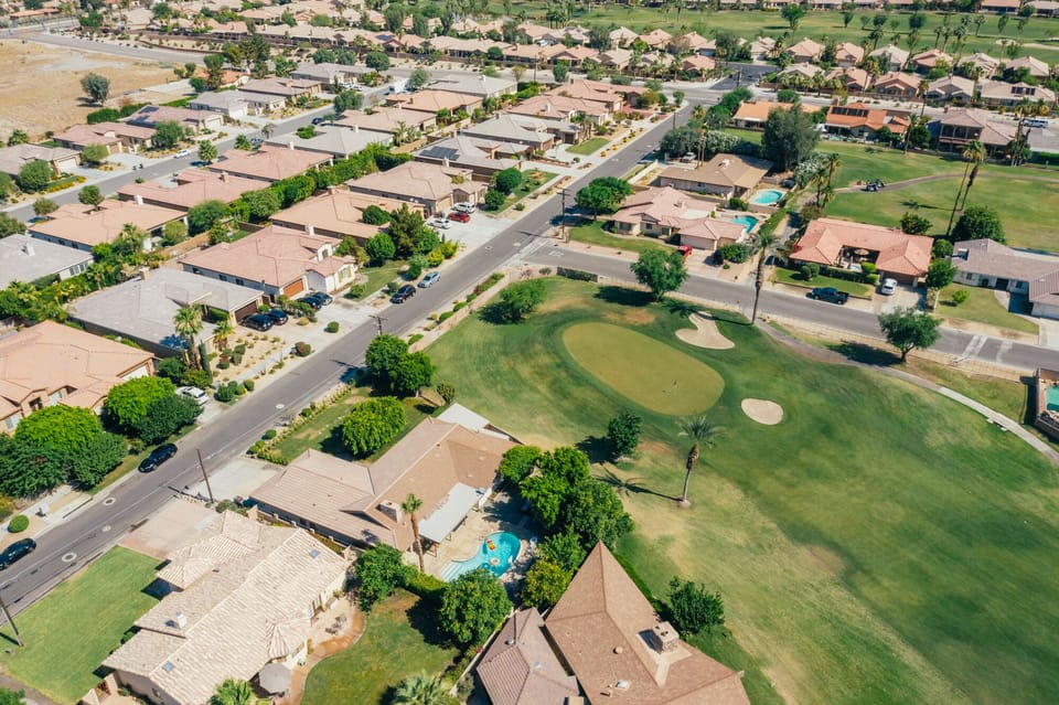 Aerial view of the home and golf course.