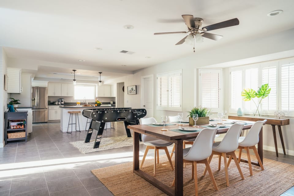 Open concept dining room area. Foosball table.