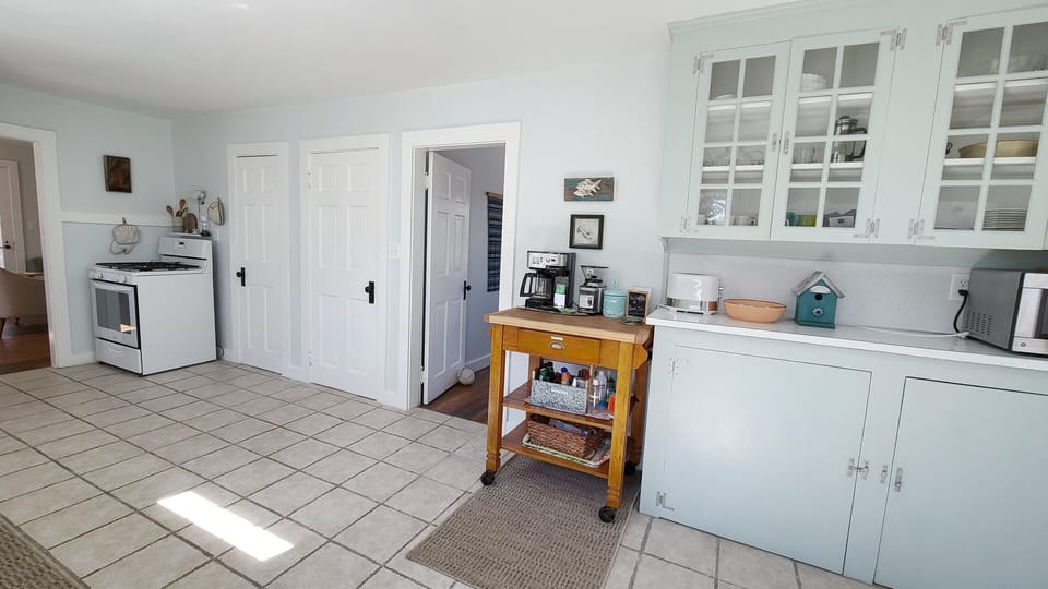 Open and bright kitchen is nicely equipped