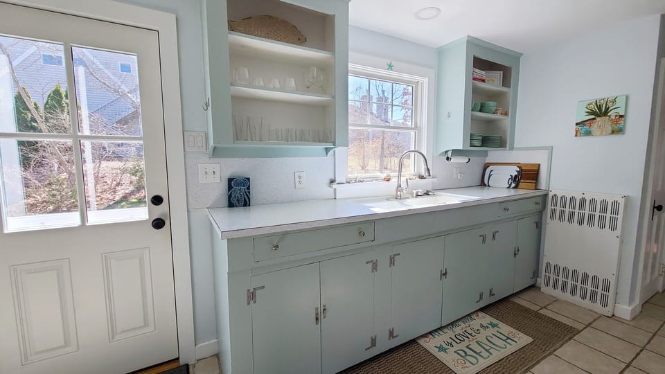 Open and bright kitchen is nicely equipped