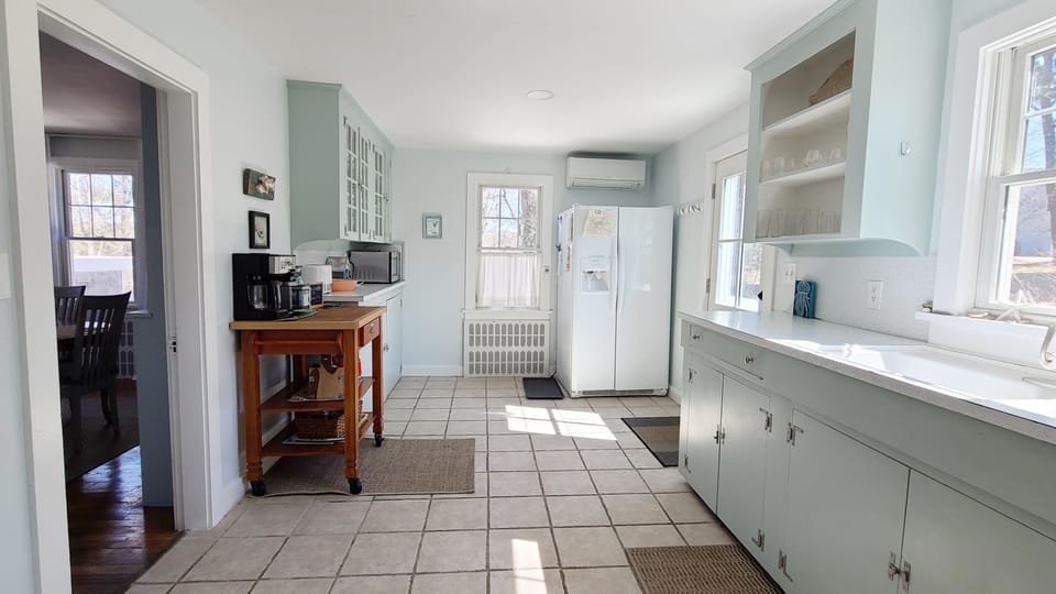 Open and bright kitchen is nicely equipped