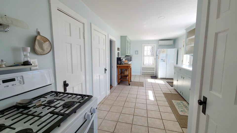 Open and bright kitchen is nicely equipped