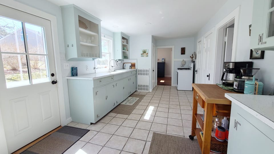 Open and bright kitchen is nicely equipped