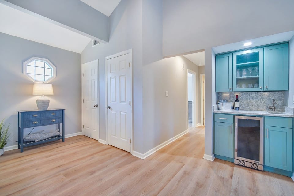 Wet bar for entertaining with wine fridge.