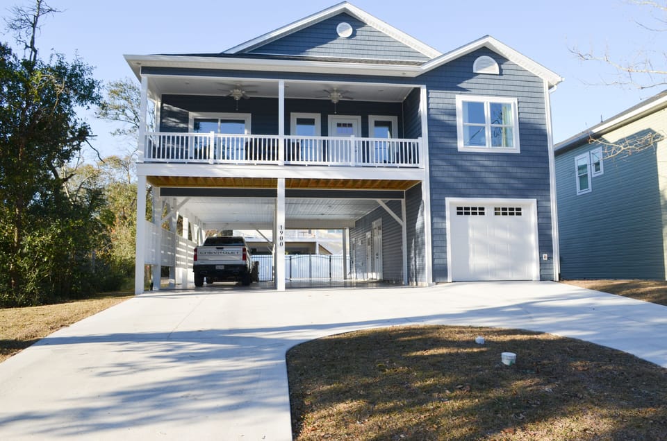 Blue Skies and Family Tides! Approximately 2400 total sqft of living space.