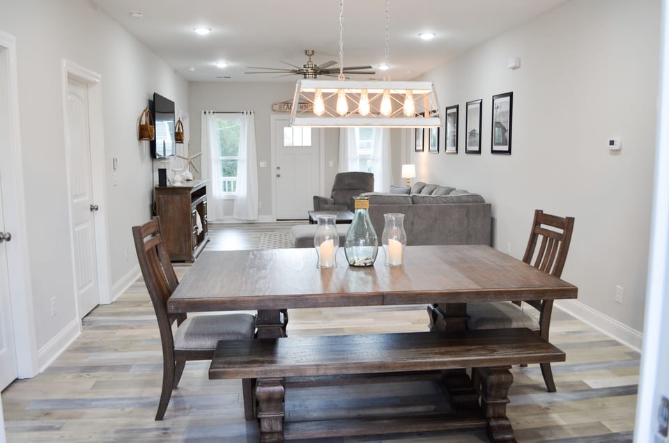 Dining table seats 10 w/additional leaf in master closet and stools in bunk room