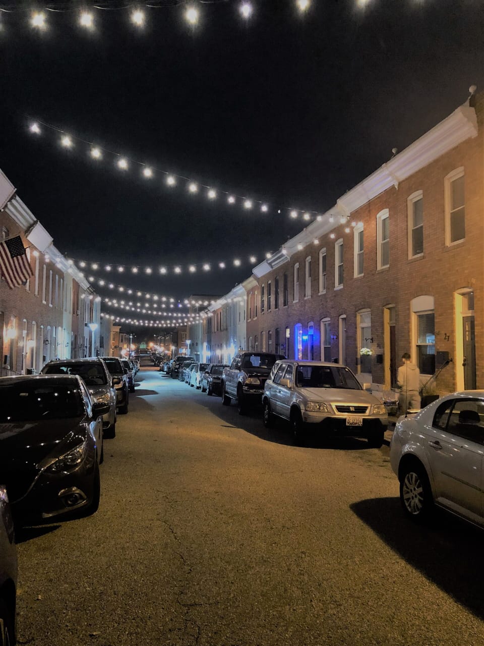 Street has cafe lights and the best neighbors