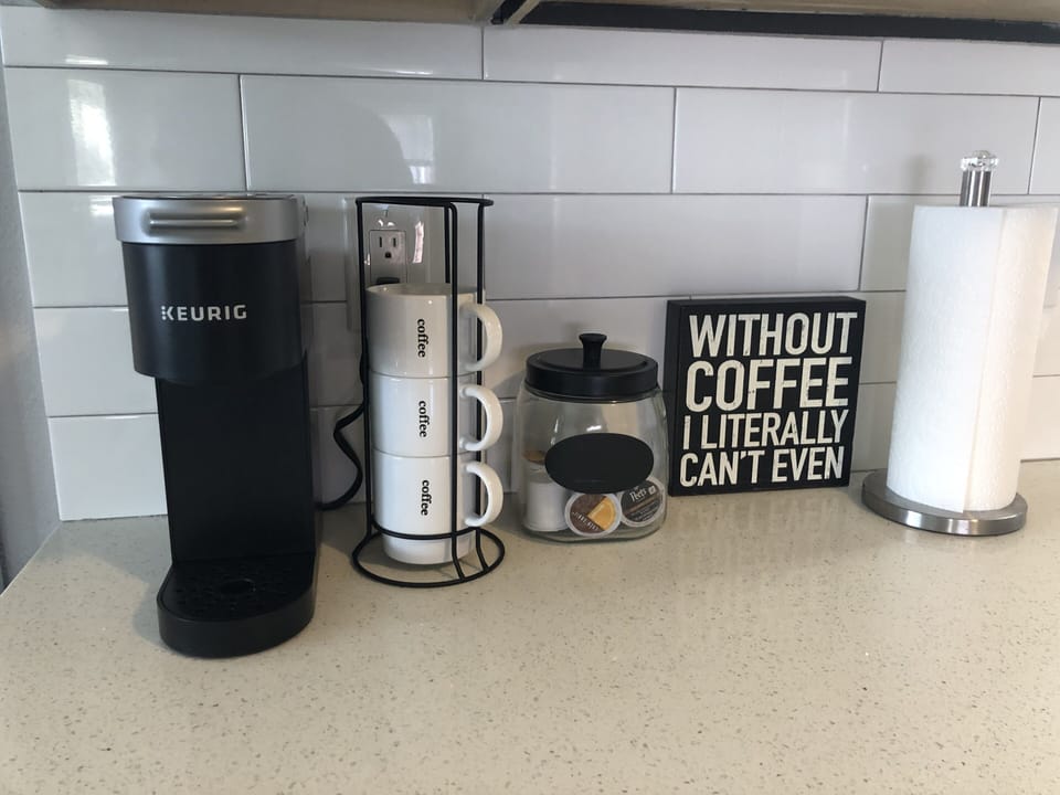 Keurig coffee maker, and coffee cups pods provided 