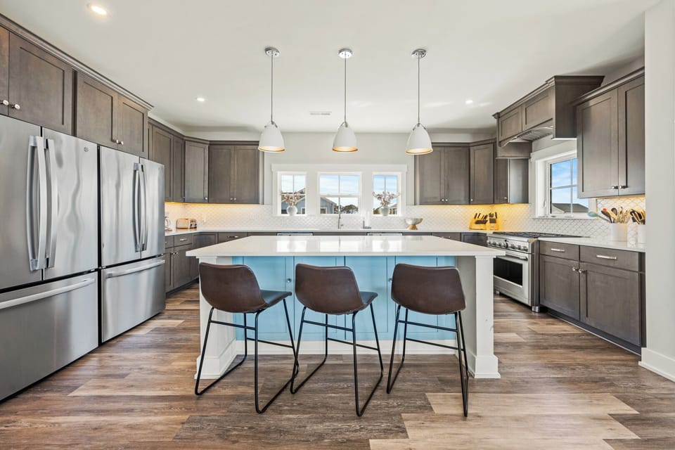Modern Kitchen with Bar Seating on Third Level