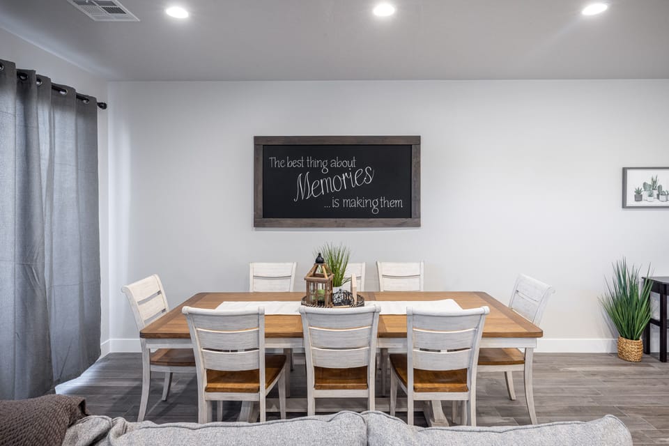 Dining Table - The beautiful wood dining room set can comfortably seat 8 people.