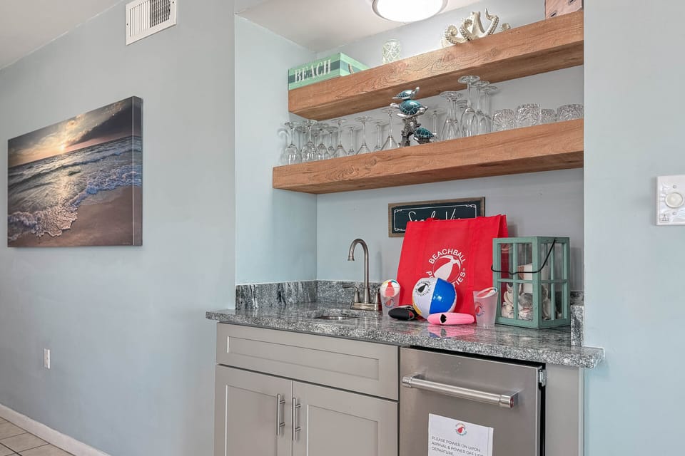 Wet bar with an ice maker and Beachball swag bag!