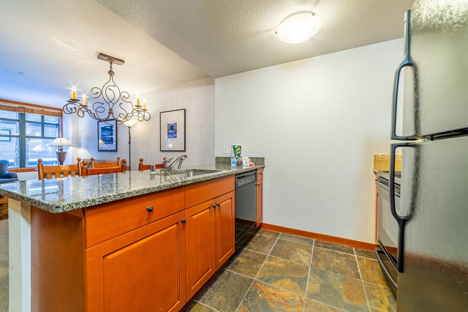 Kitchen with granite countertops.