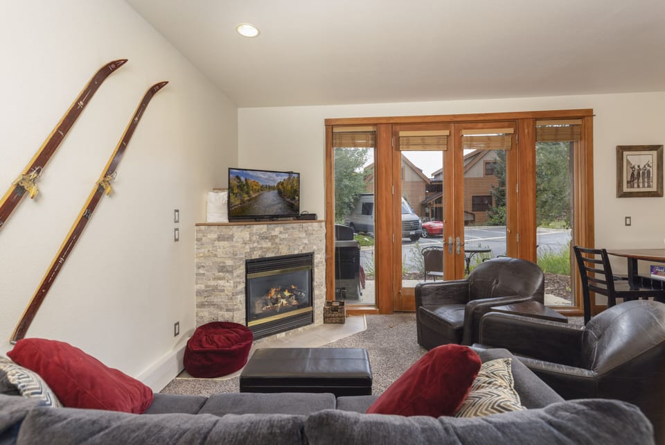Cozy main living area with gas fireplace. 