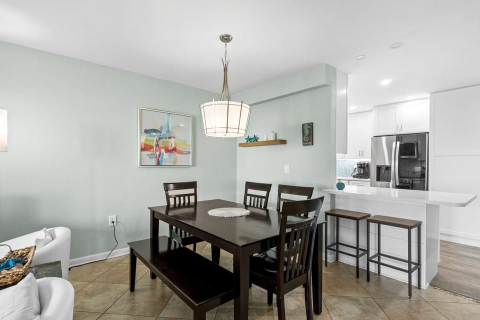 Dining table for 6 and 2 bar stools. Family meals or a friendly card game at this dining table. 


Professionally Managed By
Breathe Easy Rentals