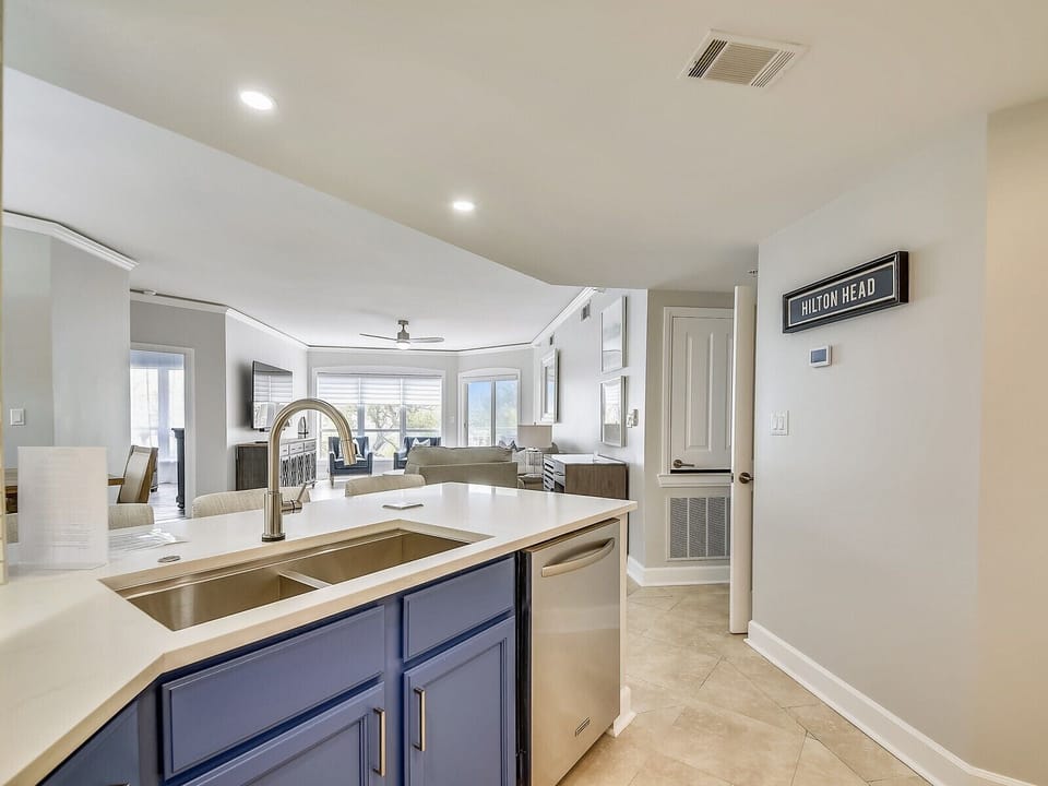 NEW Fully Equipped Kitchen Opens to Living Room and Dining Area at 2412 Windsor II