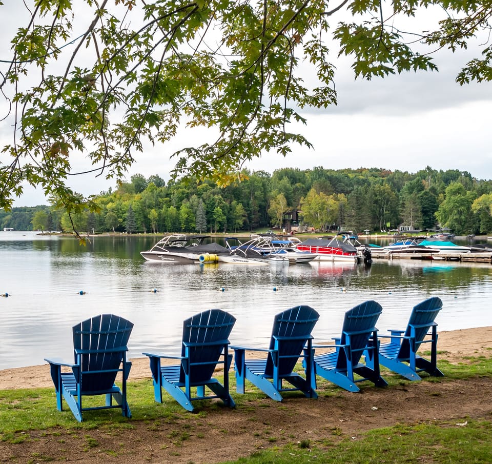 Enjoy private beach access at beautiful Peninsula Lake!
