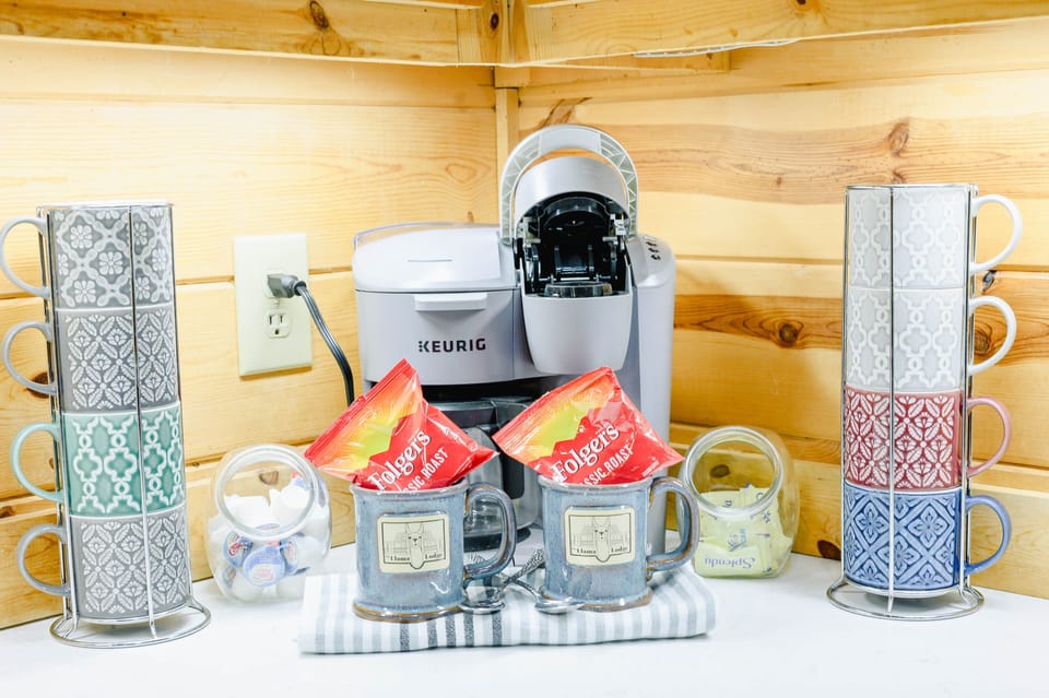 4 Start your day off on the right foot with a cup of fresh coffee made right in the comfort of your own cozy cabin. It's the perfect way to kick start your adventure-filled day!