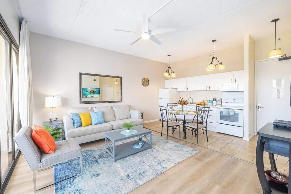 Bright living area with modern kitchen and dining space for a comfortable stay.