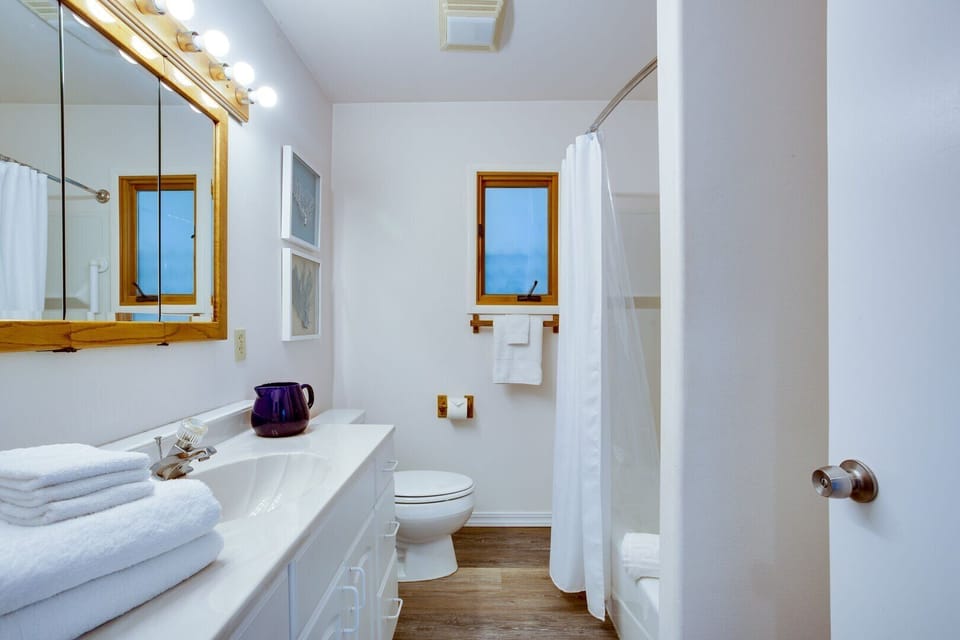 A third bath can be found in the hallway.