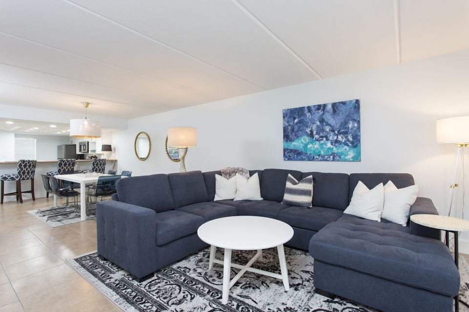 Our ultra-comfy new sectional will be the hot spot in the condo at the end of every night. Enjoy some light tv, game night, or a late-night talk on the balcony.