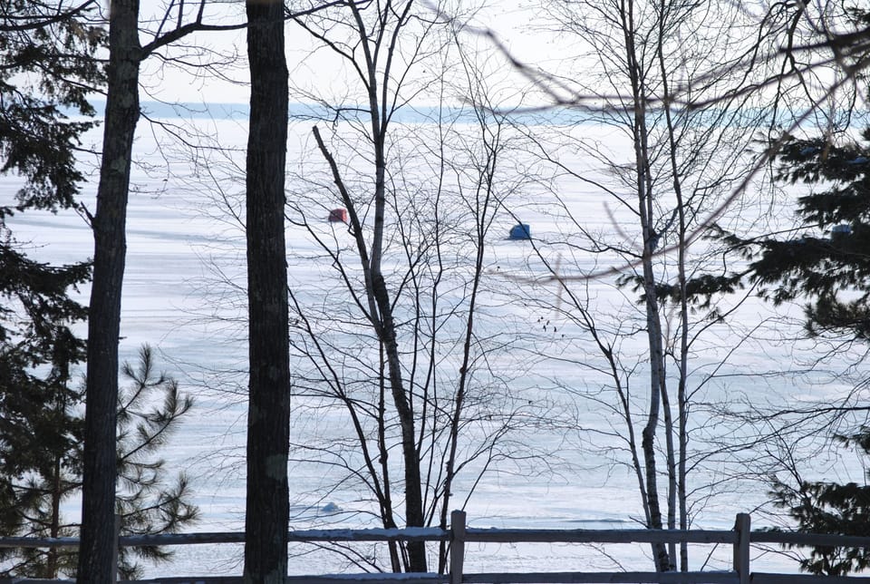 Ice Fisherman on Chequamegon Bay, Washburn, Wisconsin. 