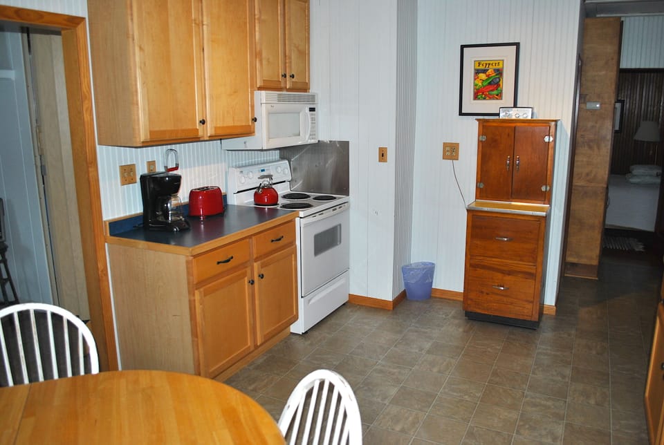 Well stocked kitchen including coffee and filters, all cookware, utensils, etc.