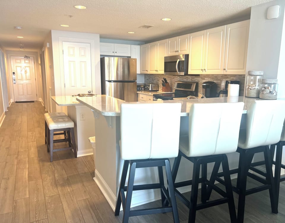 Updated quartz counter tops with bar seating
