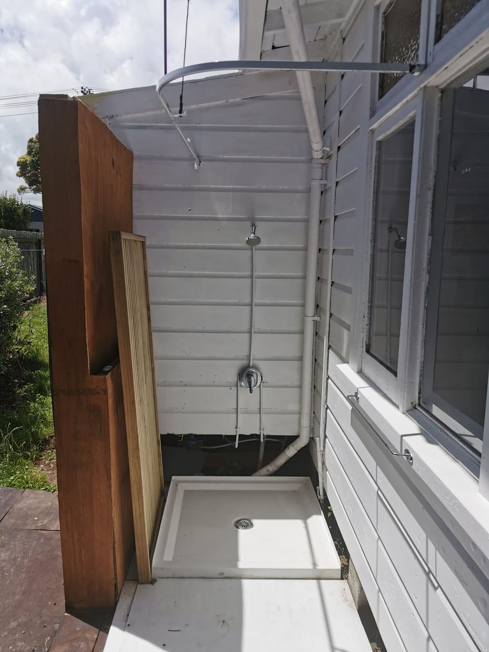 Outside shower as well as ind shower