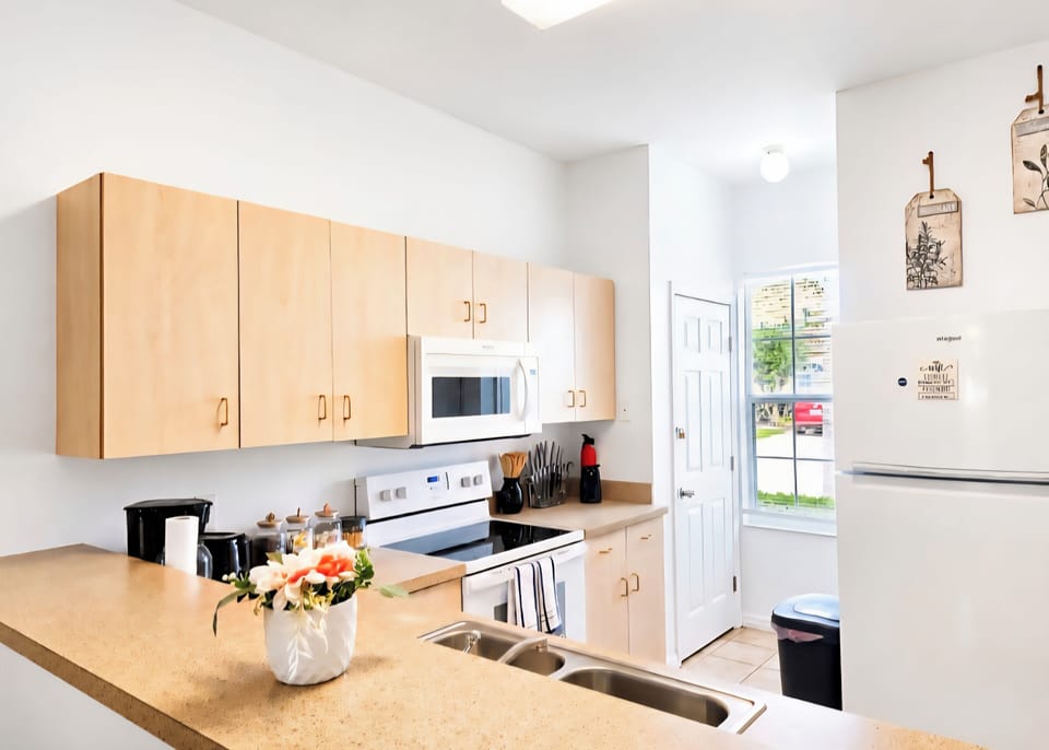 microwave, coffee and or coffee maker, kitchen, oven, refrigerator, stovetop