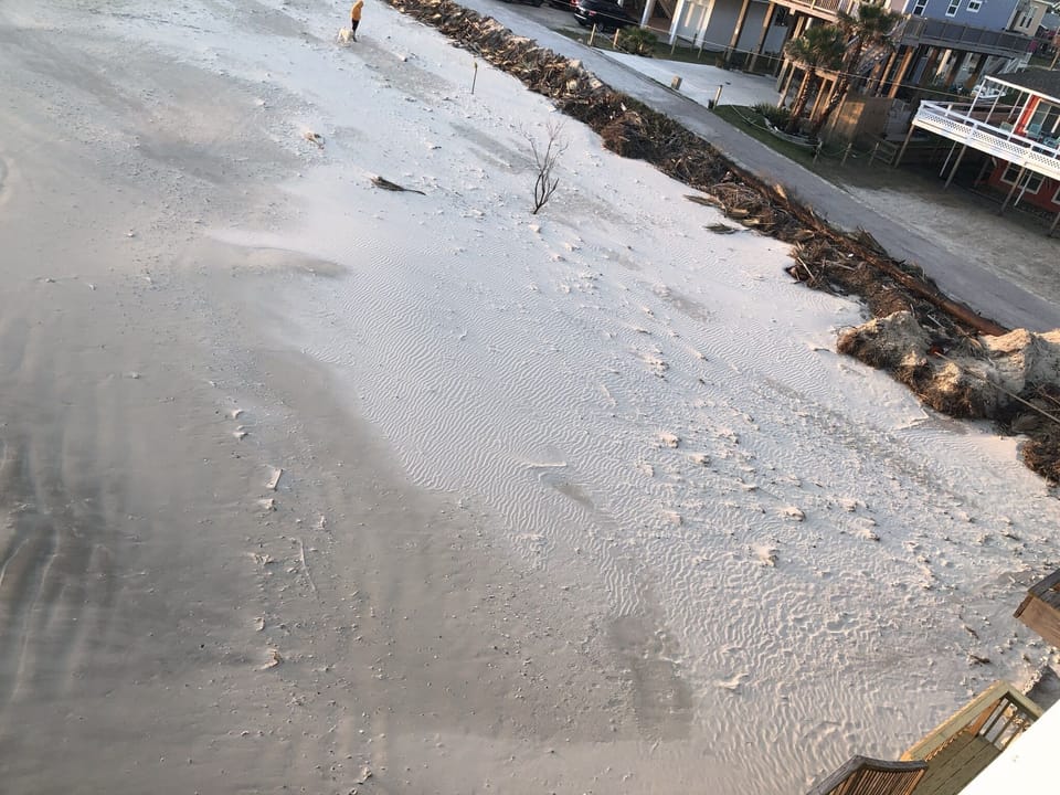 Adjacent vacant beach lot also belongs to this property.