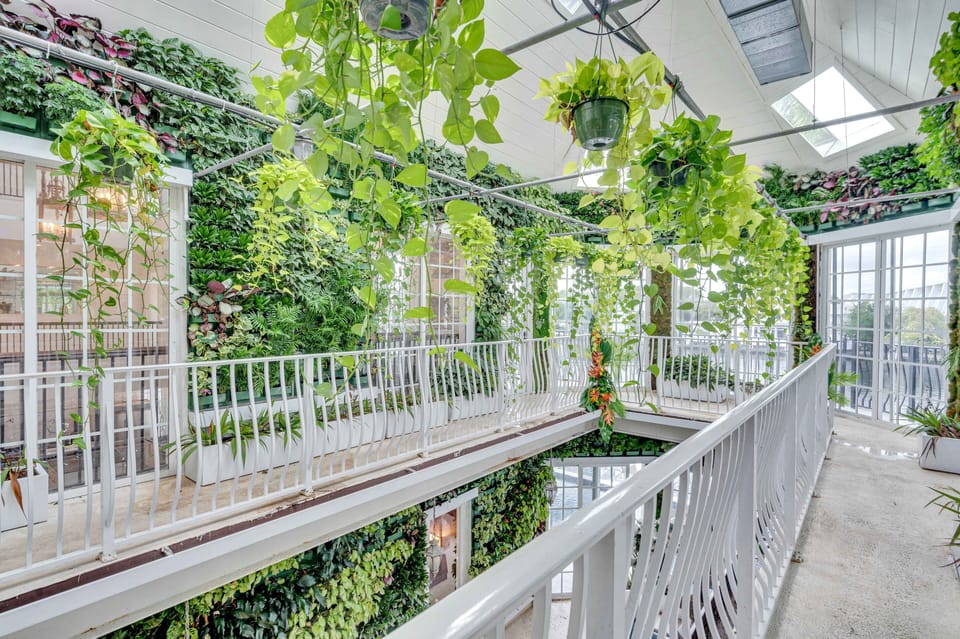 The two stories living green house is ideal for relaxing, instagram pictures, cocktail hour or weddings.