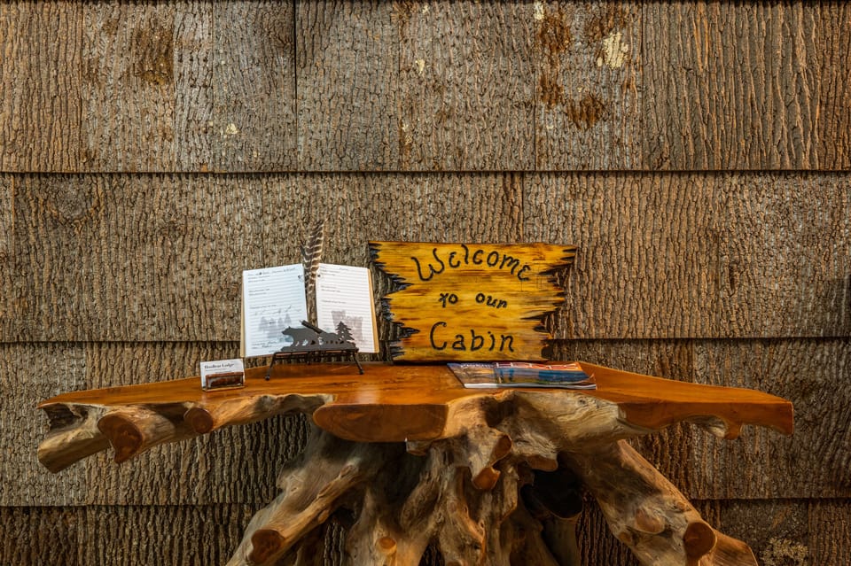 "Step into serenity! Our bark entryway welcomes you to a cozy retreat amidst nature's embrace.