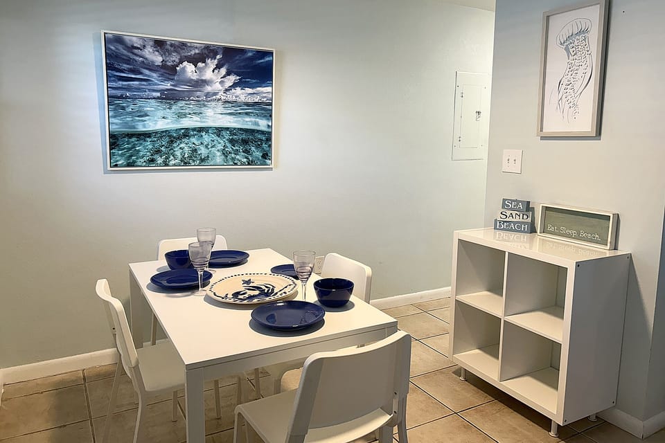 Cozy dining area with seating for four people