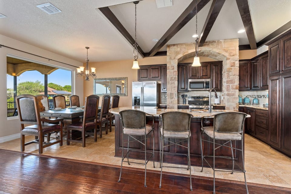 Extra barstools for seating in the kitchen.