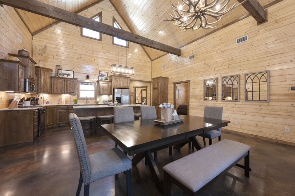 The dining area seamlessly transitions into the kitchen