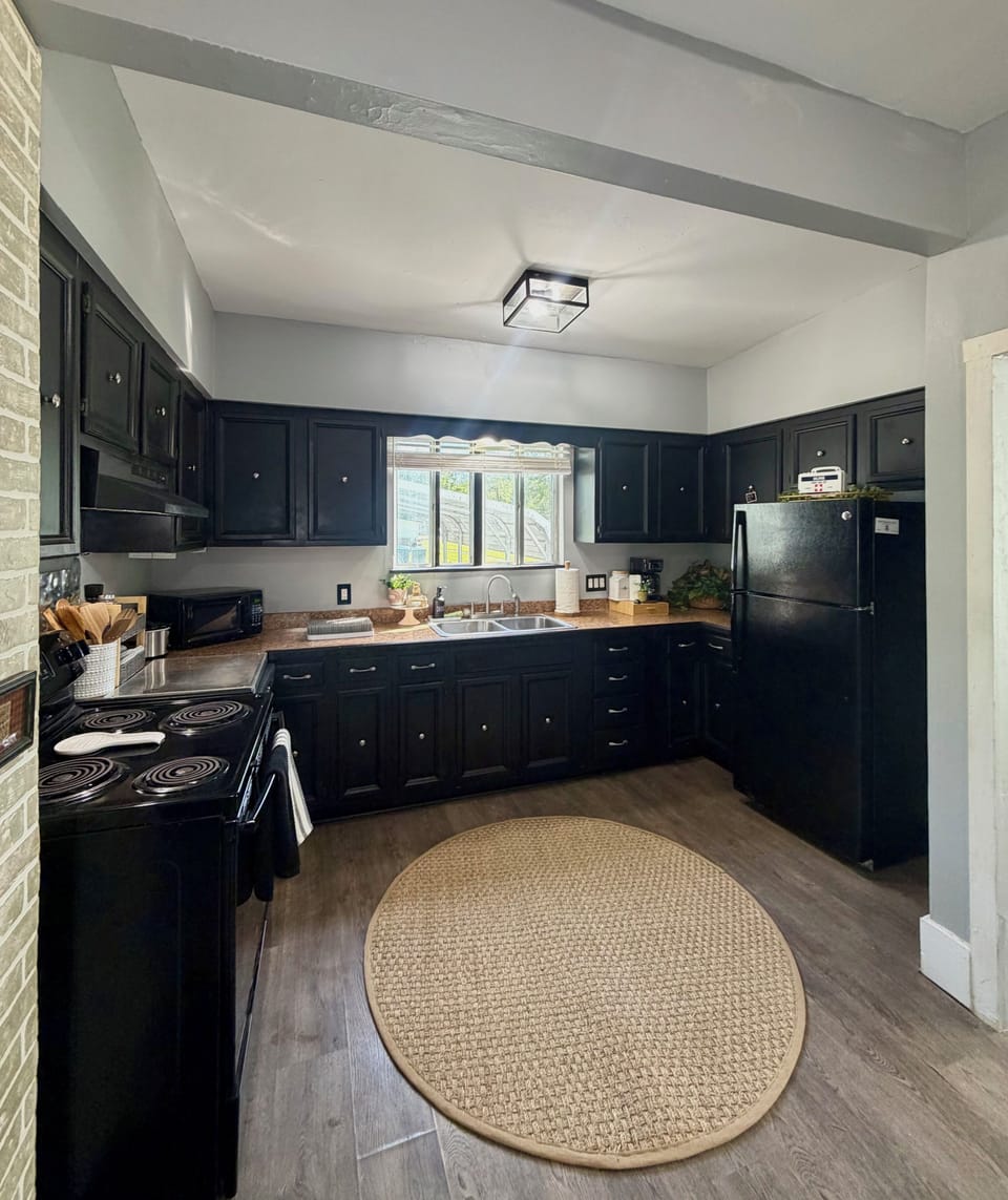 Full clean kitchen to cook in! PLENTY of cooking pots, pans, and utensils !