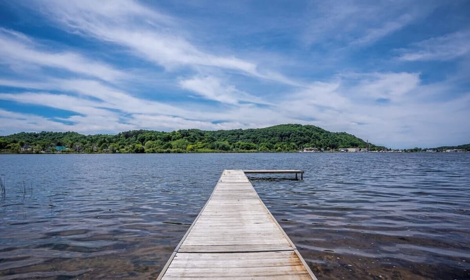 EXTERIOR:  The large private dock that extends out into Betsie Lake.