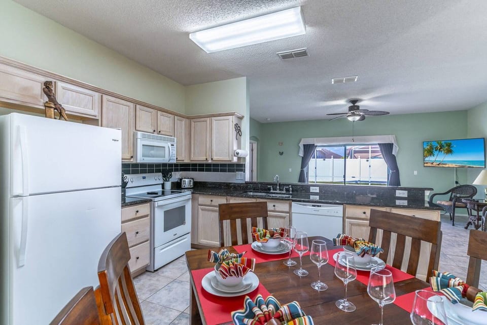 Kitchen and dining area with seating for 6