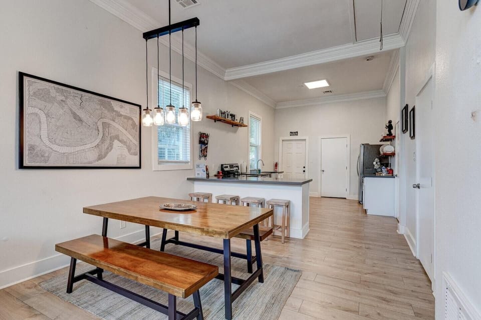 Open, light-filled space w/ modern pendants — bright & airy from every angle.
