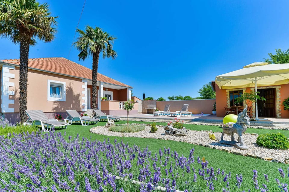 Holiday house with traditioanl dalmatian tavern, pool, beautiful garden and outdoor furniture