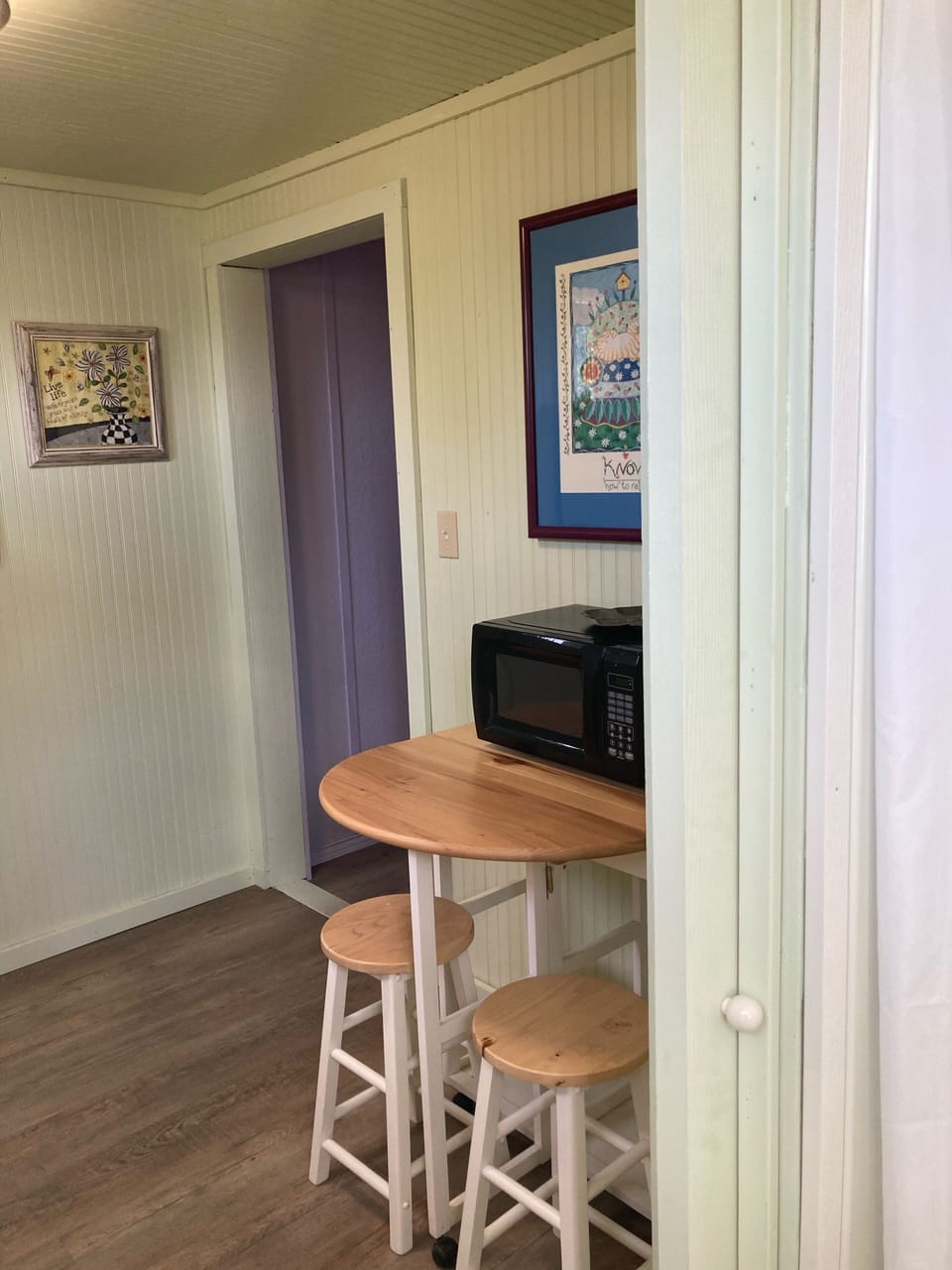 Small table for eating or work space.  More tables outside for eating or working