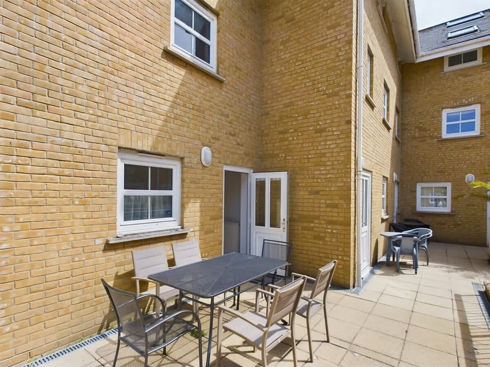 The shared courtyard just off the kitchen is perfect for evening drinks or alfresco dining.