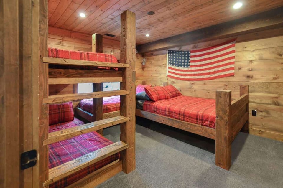 Bunk Room: Perfect for gear-laden adventurers; rustic charm with playful bunks and classic flair!