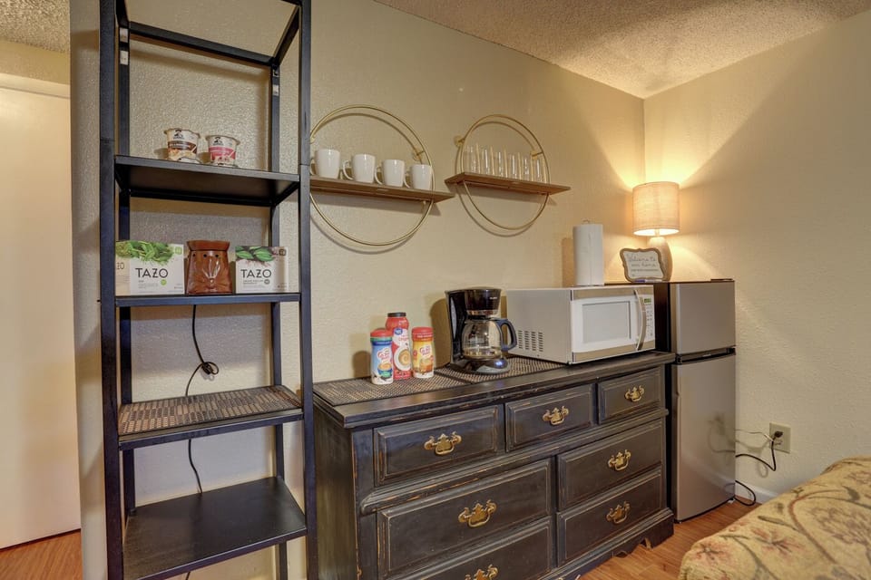 microwave and fridge area