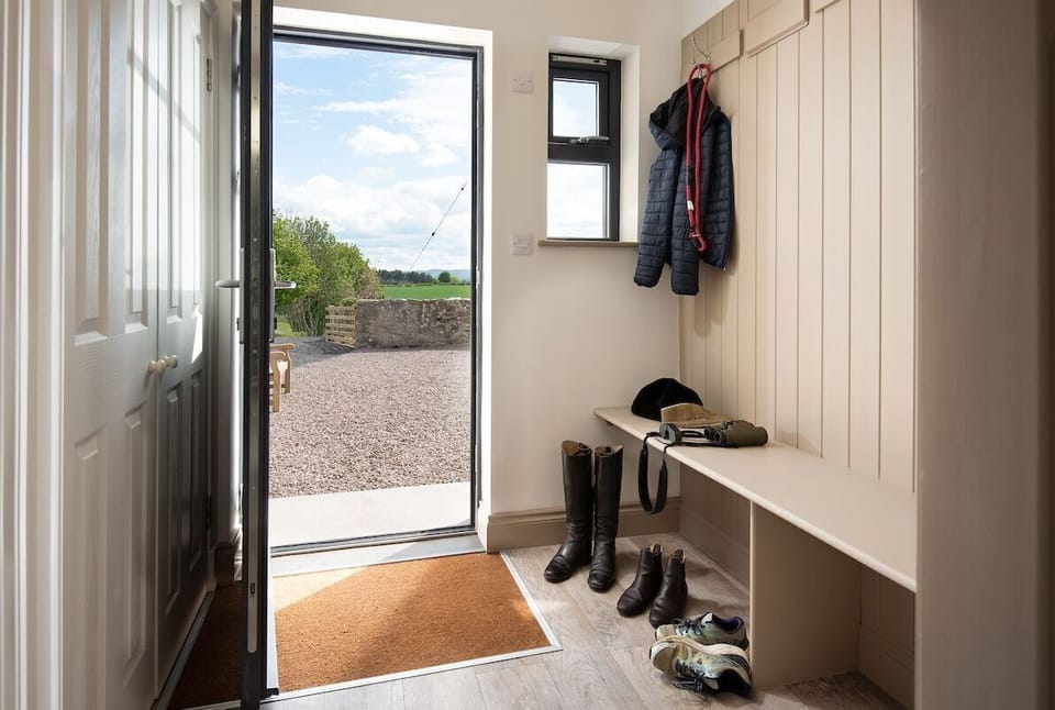 Lookout South - with boot room leading out to parking area and enclosed garden