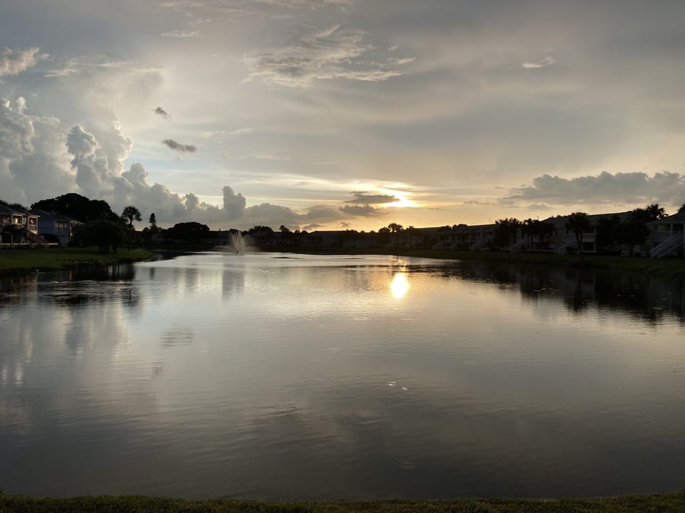 There’s a walkway to stroll around the lagoon right outside the condo.
