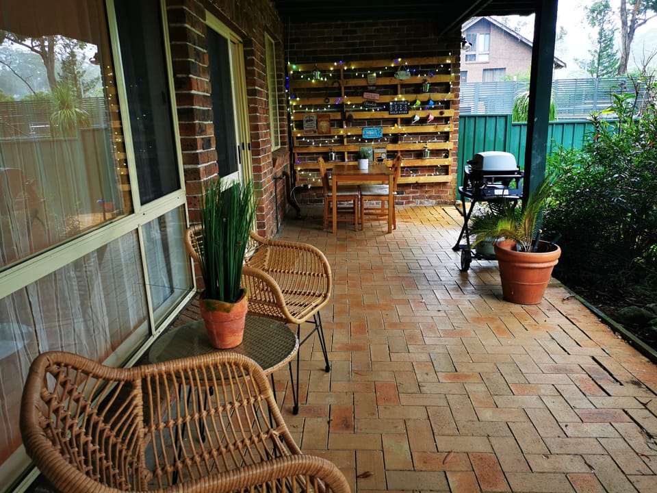 Private patio with gas BBQ and outdoor dining table
