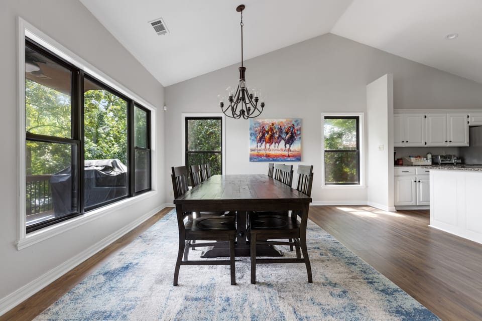 Dining area (seats up to 8) flows into kitchen.